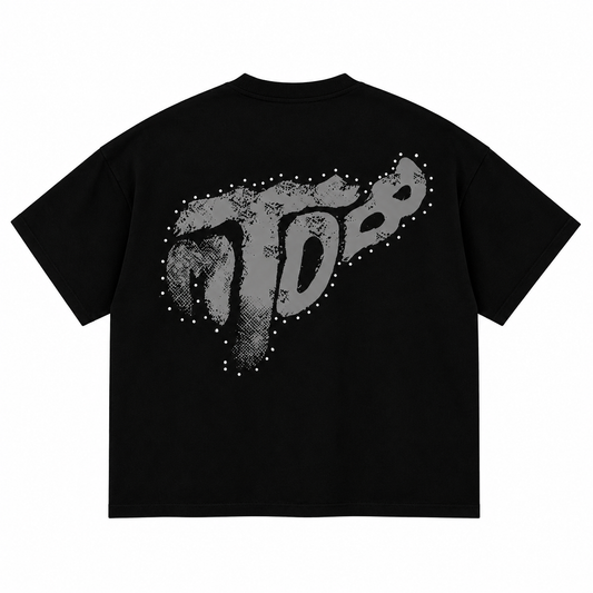 Espalda de playera negra TOMBO LOGO PLAYERA NEGRA OVER PREMIUM sobre fondo blanco.